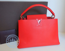 Louis Vuitton CAPUCINES MM Handbag, in Red